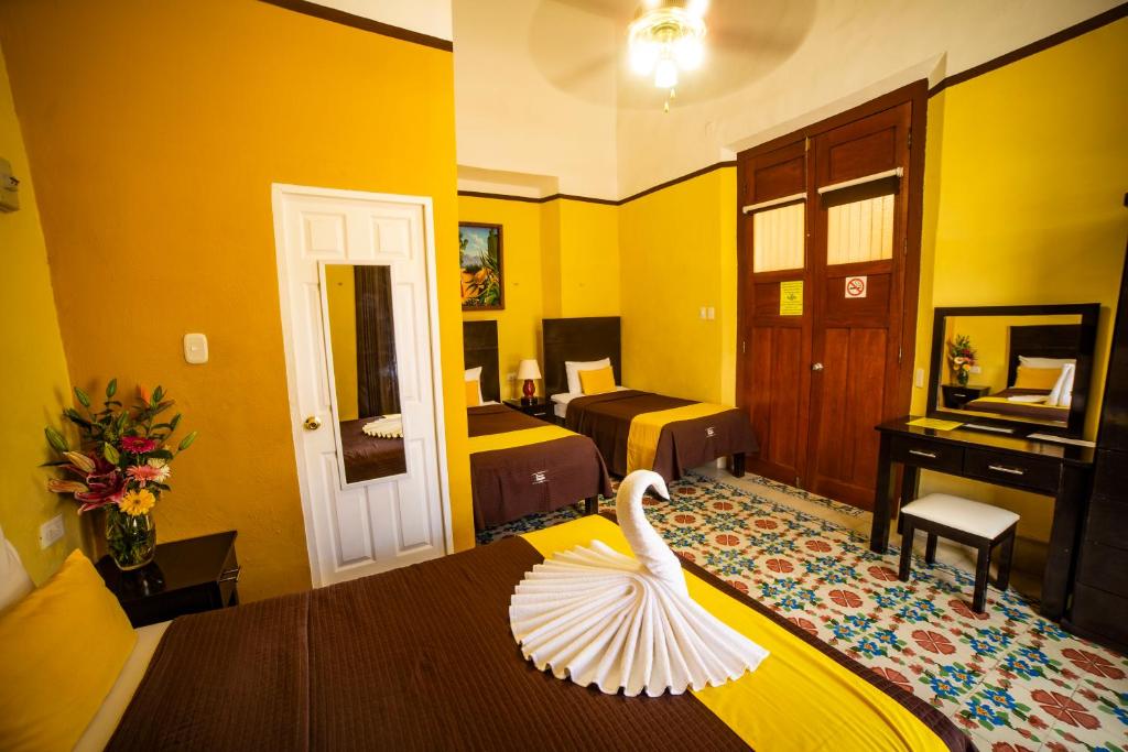 Postel nebo postele na pokoji v ubytování Hotel del Peregrino Boutique Hotel