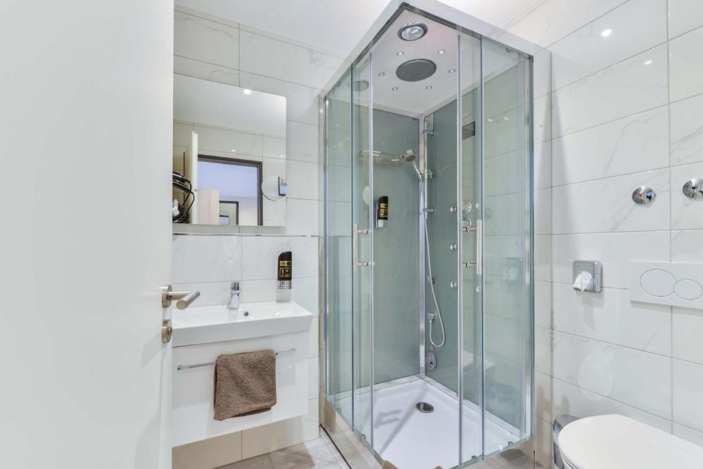 Koupelna v ubytování Hotel Lumi