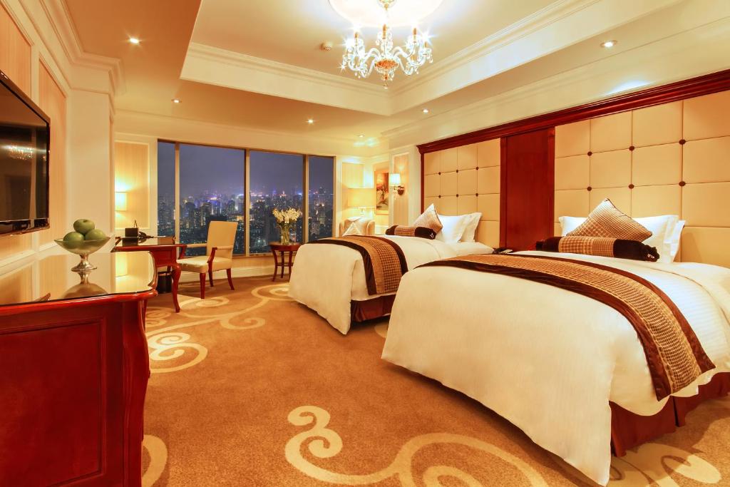 Postel nebo postele na pokoji v ubytování Kempinski Hotel Guiyang