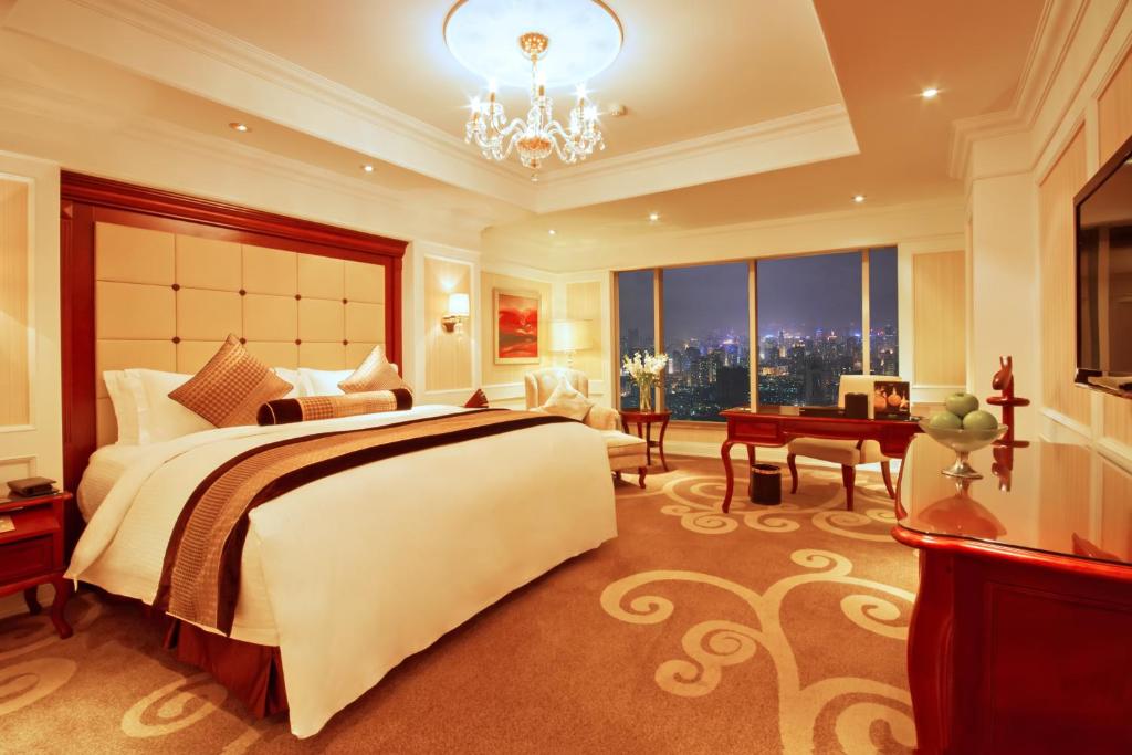 Postel nebo postele na pokoji v ubytování Kempinski Hotel Guiyang