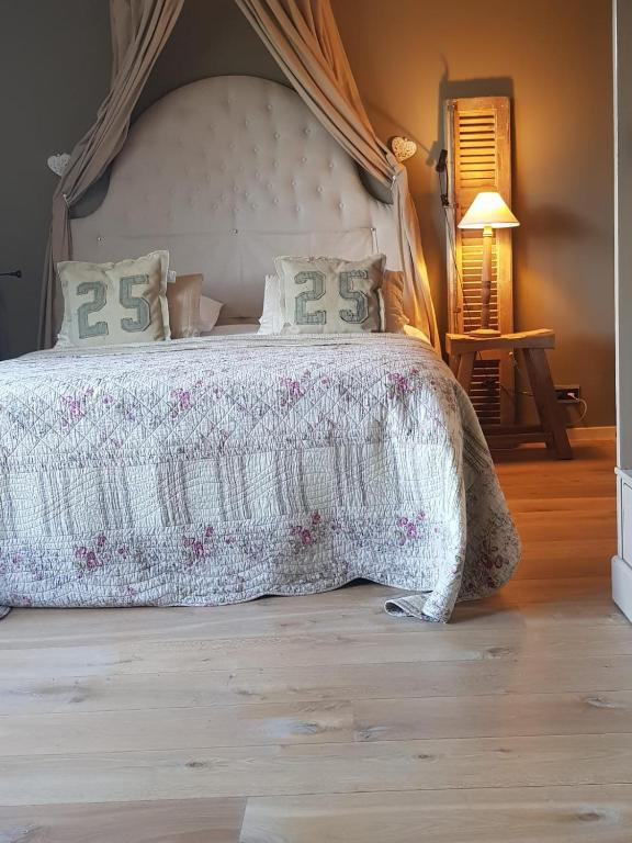 Postel nebo postele na pokoji v ubytování Bed and breakfast Mooi Achel