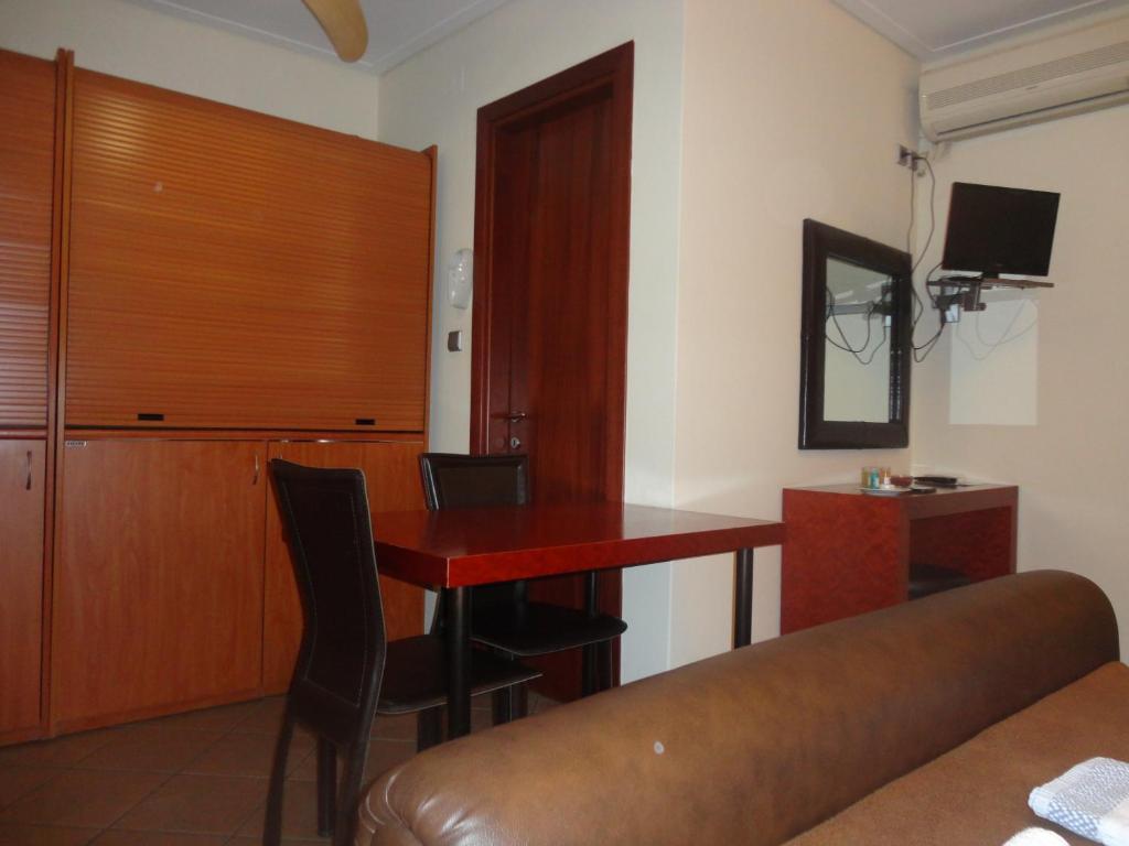 Telewizja i/lub zestaw kina domowego w obiekcie Lirio Guest House
