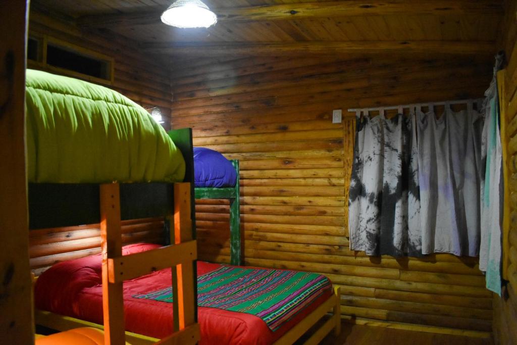 Postel nebo postele na pokoji v ubytování Infinito Chill0ut