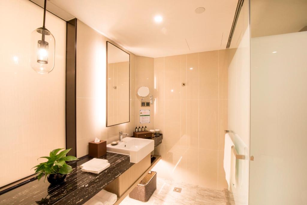 Koupelna v ubytování Jin Jiang Pine City Hotel