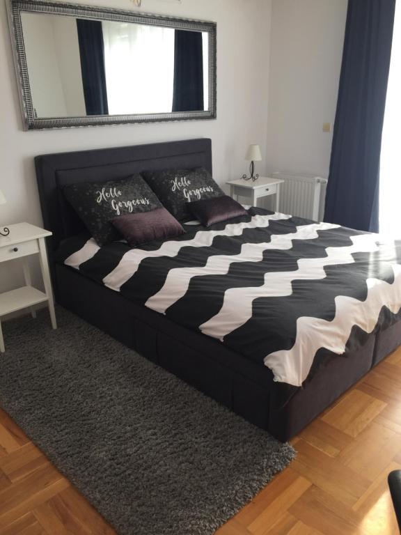 Postel nebo postele na pokoji v ubytování Studio apartman Lara ***