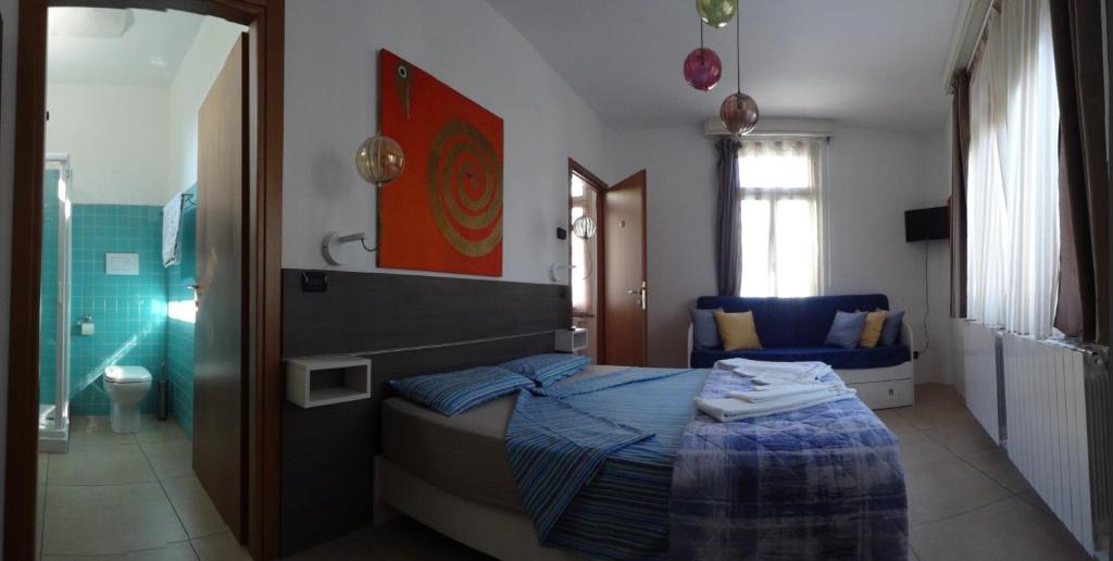 Postel nebo postele na pokoji v ubytování Prenditempo