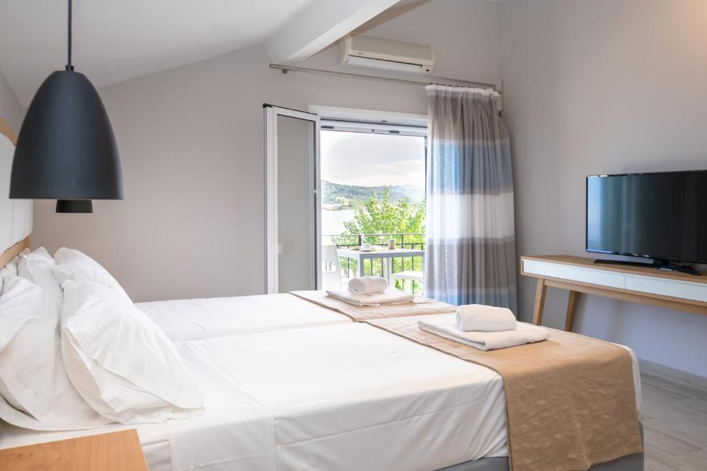 Postel nebo postele na pokoji v ubytování Electra Apartments