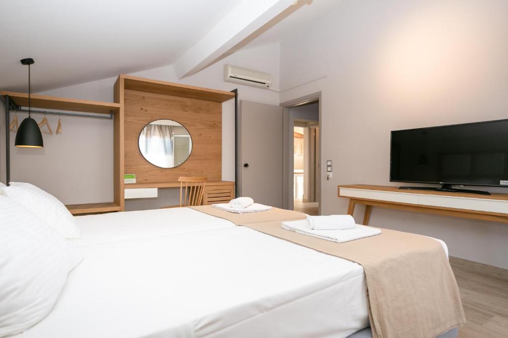 Postel nebo postele na pokoji v ubytování Electra Apartments