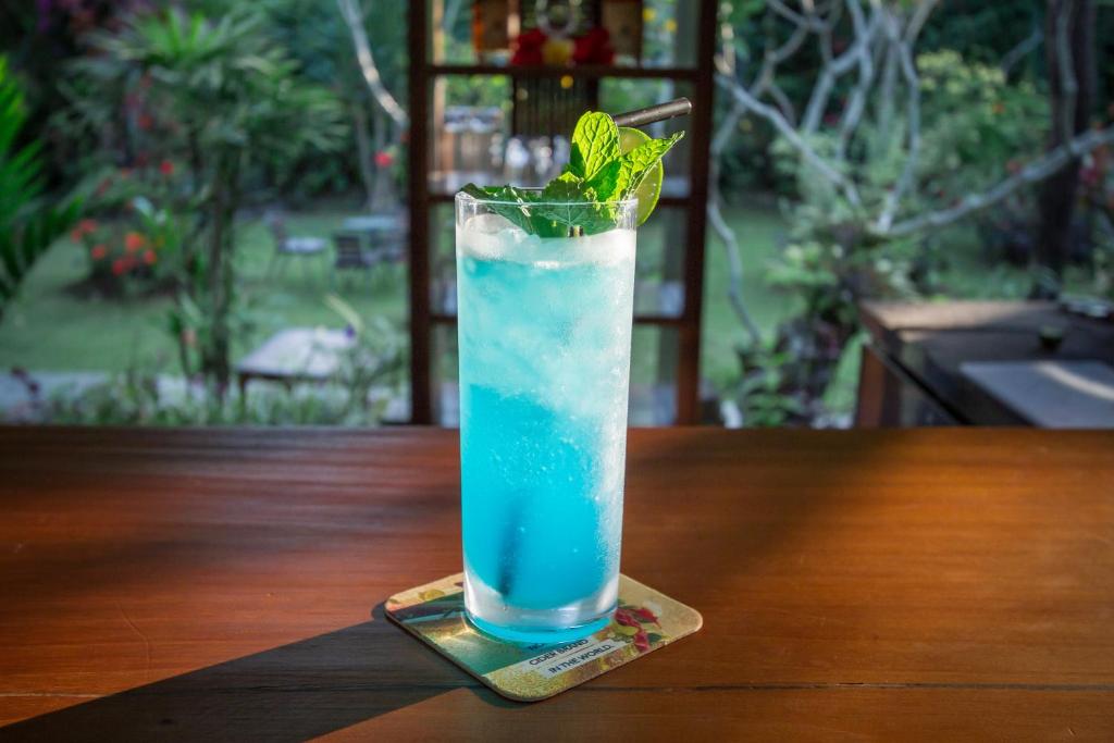 Nápoje v ubytování Ubud Inn Cottage by Prasi