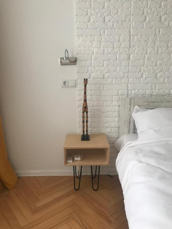 Postel nebo postele na pokoji v ubytování Guest House Story