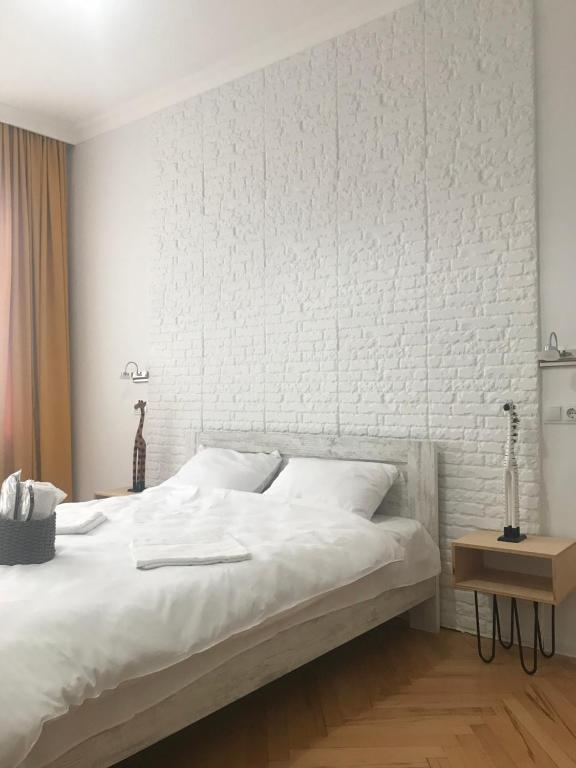 Postel nebo postele na pokoji v ubytování Guest House Story