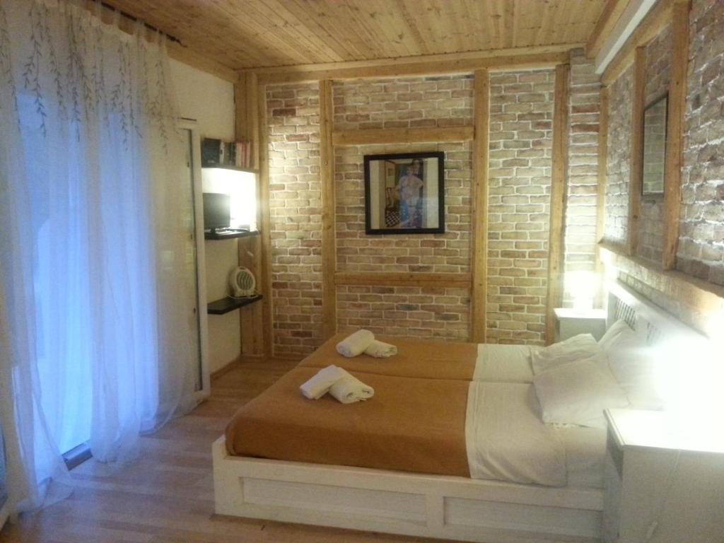 Postel nebo postele na pokoji v ubytování Villa Tasos