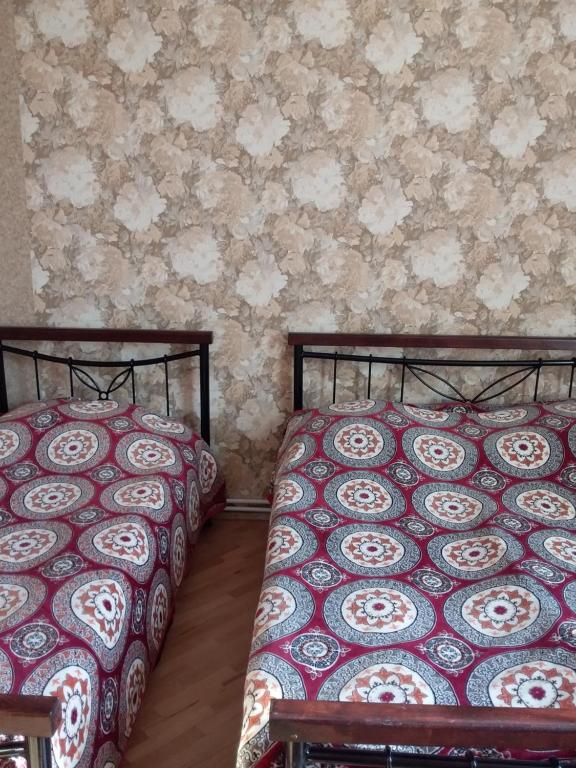 Postel nebo postele na pokoji v ubytování Guest House Medea