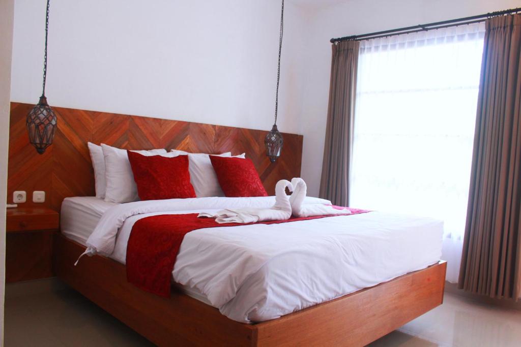 Postel nebo postele na pokoji v ubytování Maple House