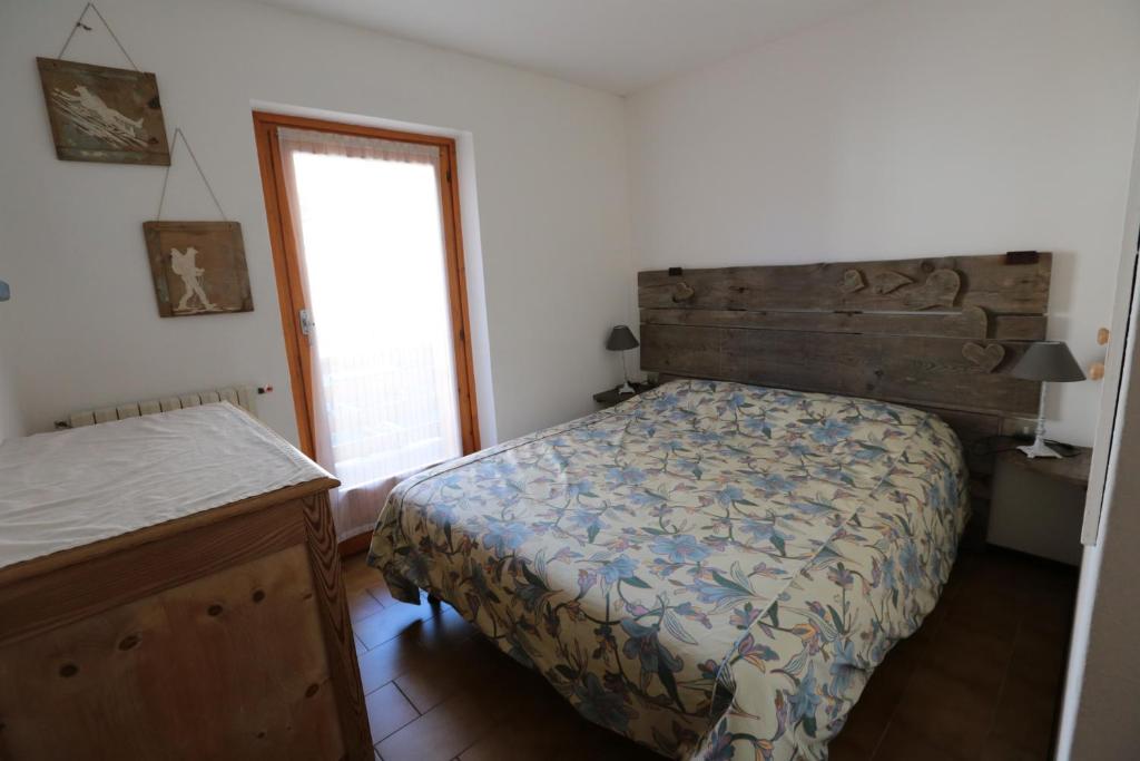 מיטה או מיטות בחדר ב-Appartamento SPAZZACA'