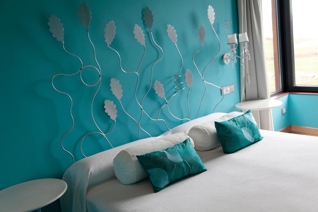 Postel nebo postele na pokoji v ubytování Hotel Araz
