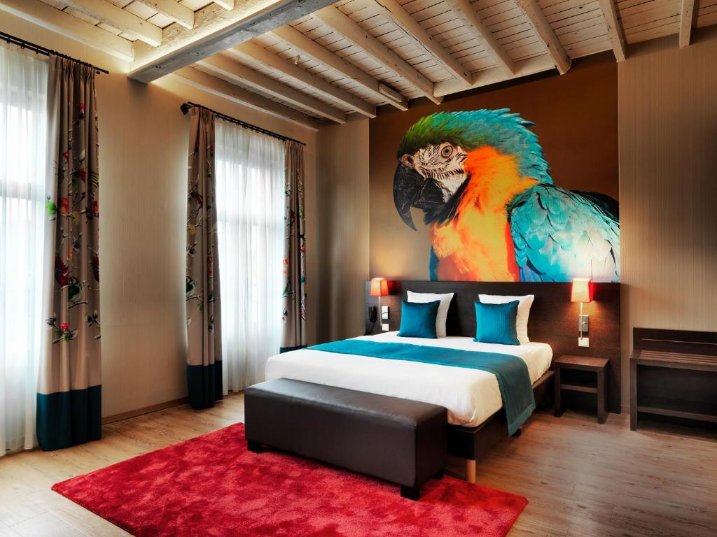 Postel nebo postele na pokoji v ubytování Hotel Harmony