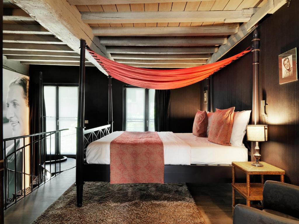 Postel nebo postele na pokoji v ubytování Hotel Harmony
