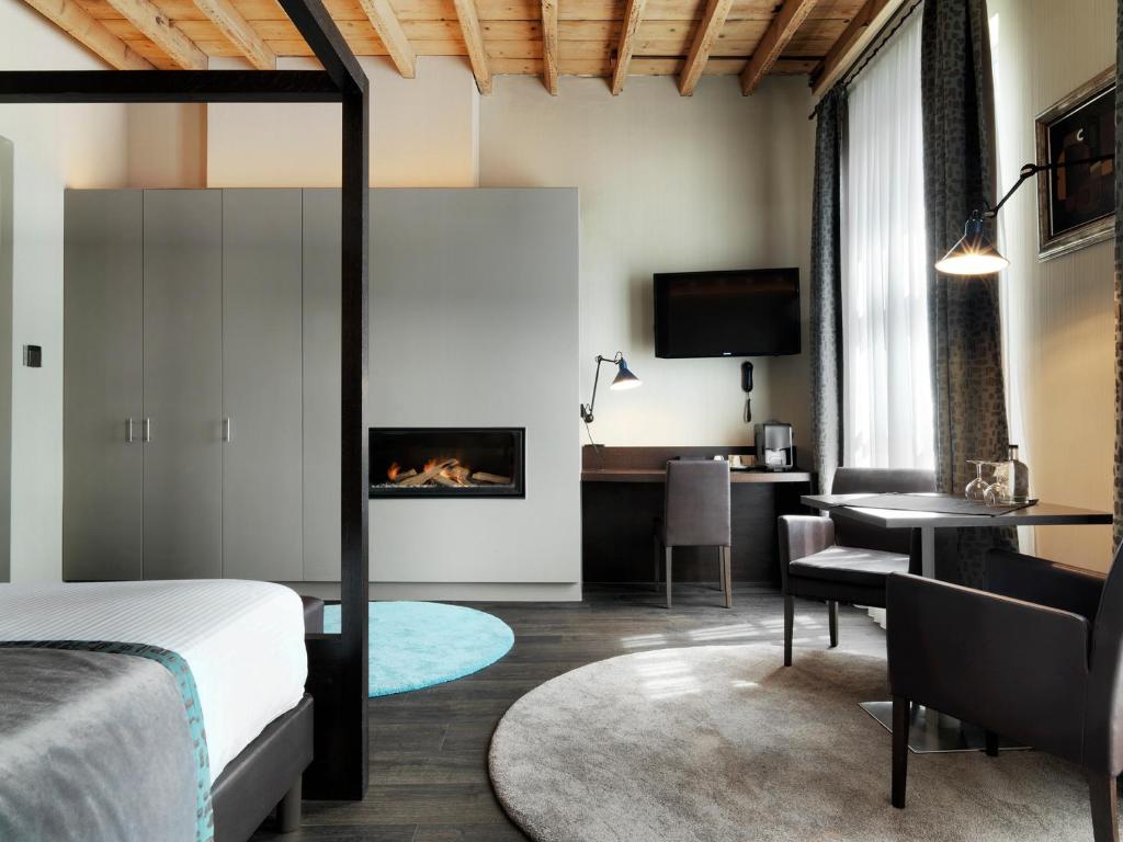 Postel nebo postele na pokoji v ubytování Hotel Harmony