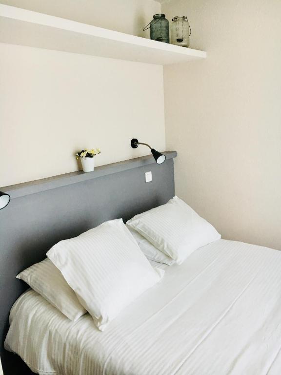 Postel nebo postele na pokoji v ubytování Le Cannier Hotel