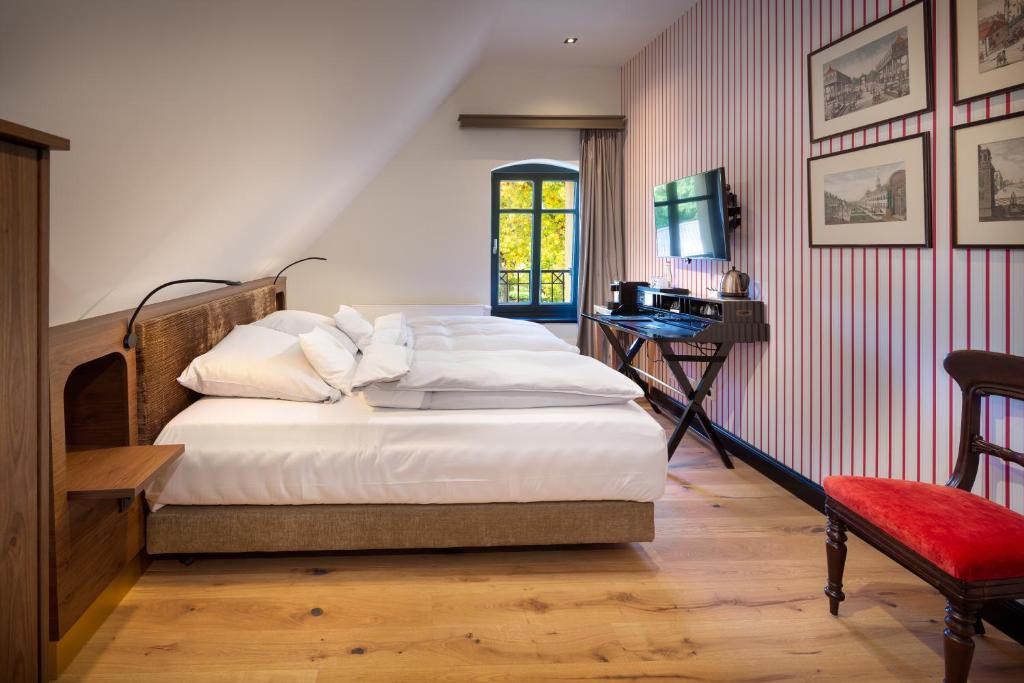 Postel nebo postele na pokoji v ubytování Hotel Rittergut Osthoff