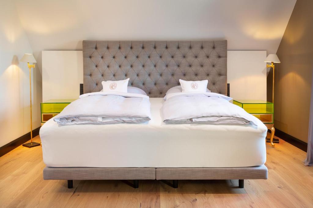 Postel nebo postele na pokoji v ubytování Hotel Rittergut Osthoff