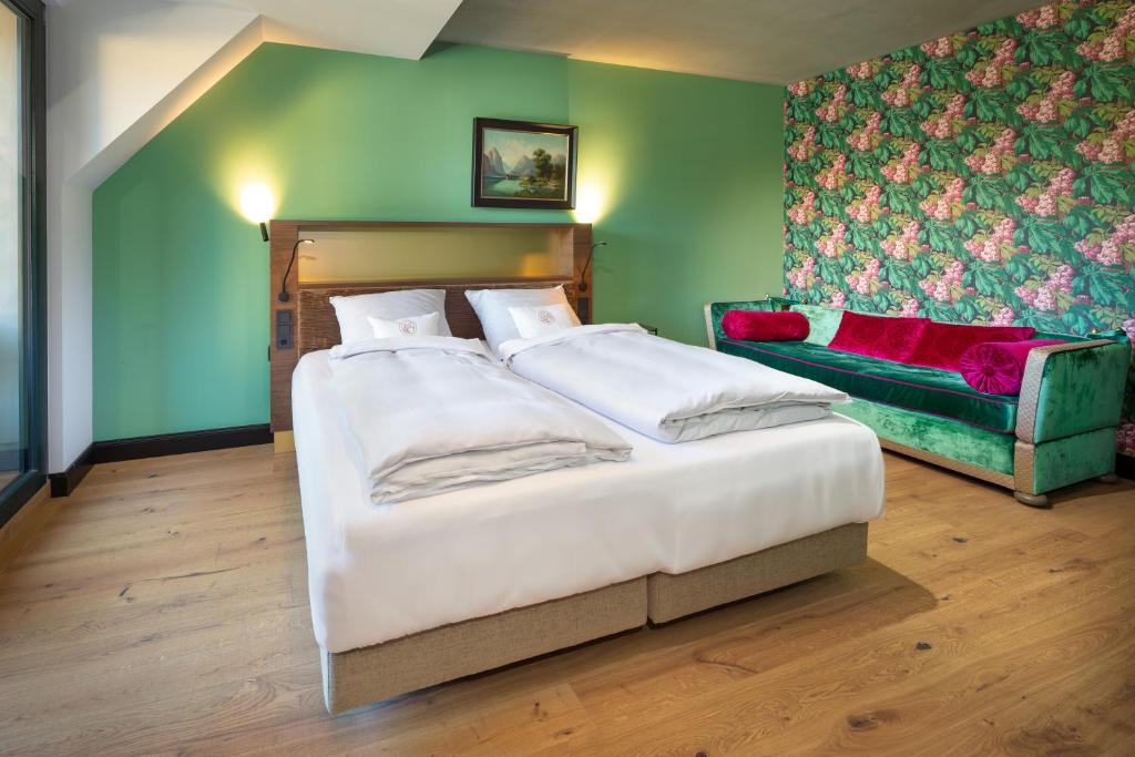 Postel nebo postele na pokoji v ubytování Hotel Rittergut Osthoff