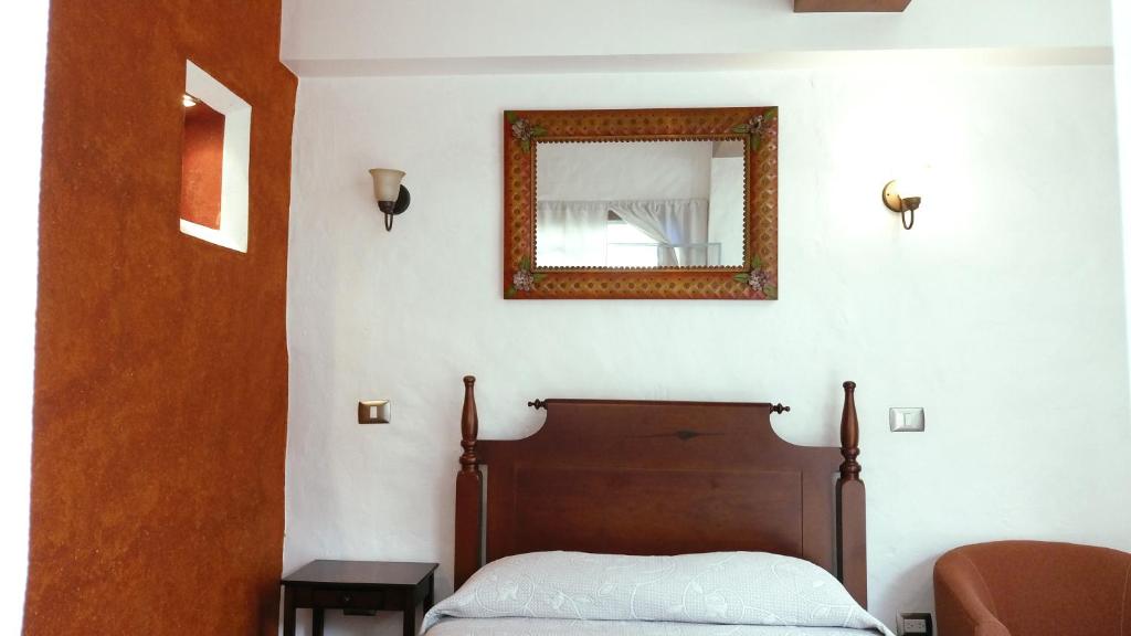 Postel nebo postele na pokoji v ubytování Posada Antiguo Camino Real