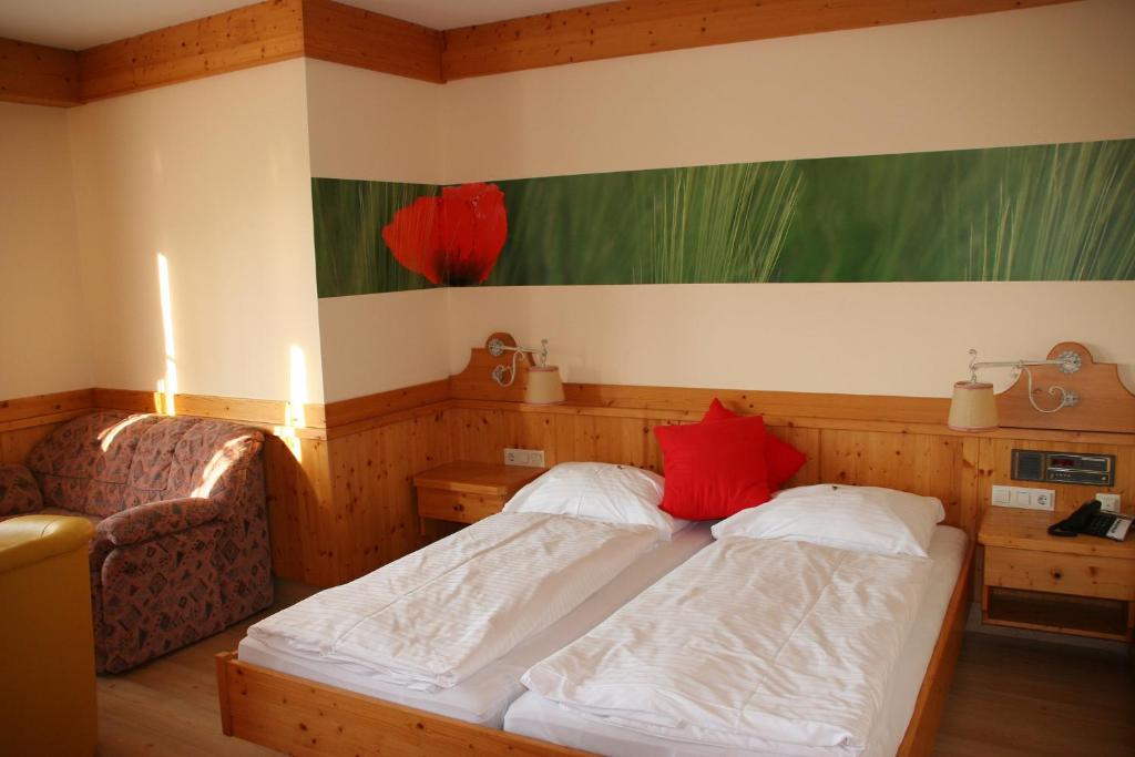 Posteľ alebo postele v izbe v ubytovaní Mohnhotel - Bergwirt Schrammel