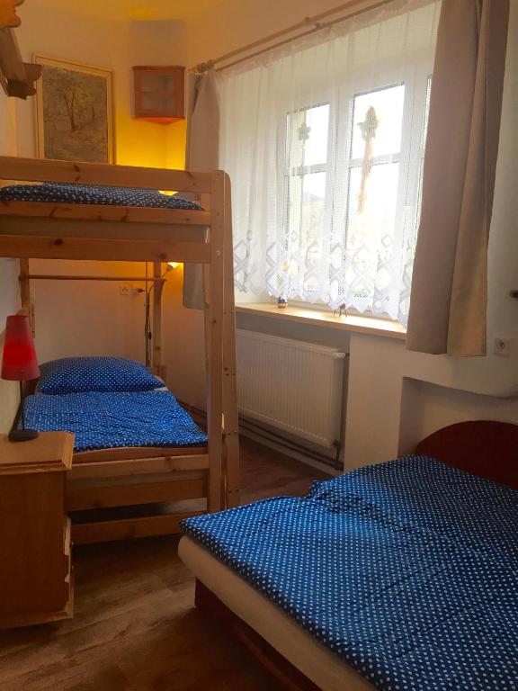Postel nebo postele na pokoji v ubytování Chalupa U Potoka