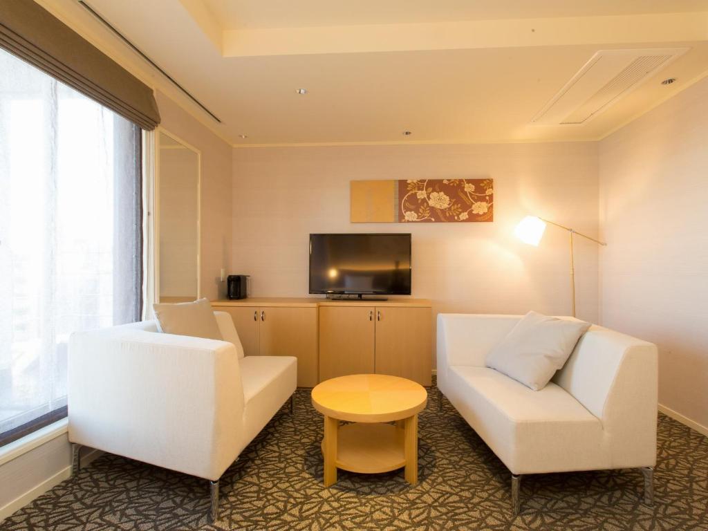 Kuchyň nebo kuchyňský kout v ubytování Hotel Shiki Utsubo Park