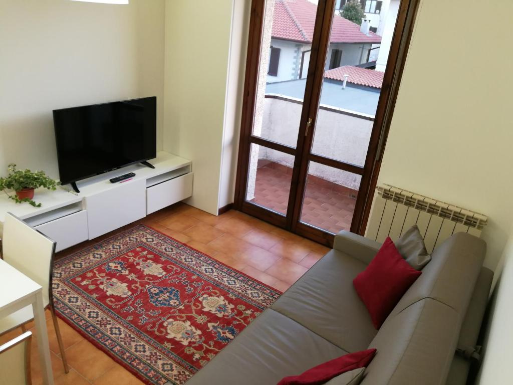 TV a/nebo společenská místnost v ubytování Carducci Apartment - THE V Collection