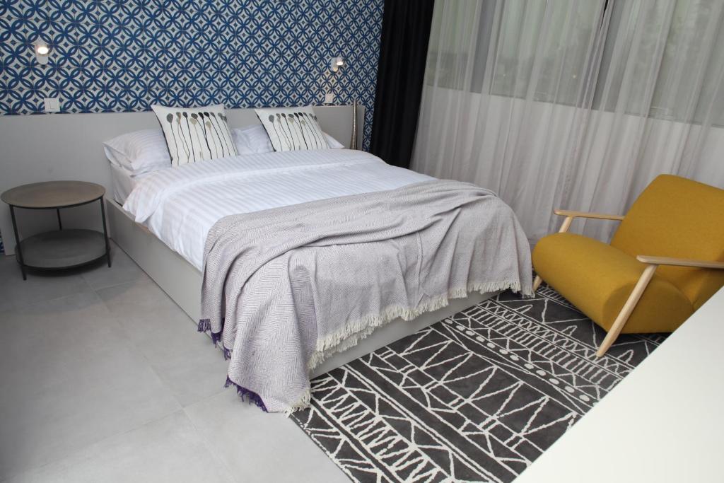 Postel nebo postele na pokoji v ubytování Hotel Cubis