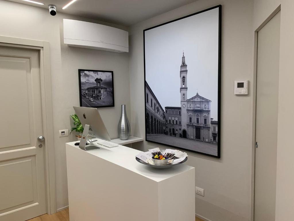 Palazzo Vasarri - Luxury design suitesにあるテレビまたはエンターテインメントセンター