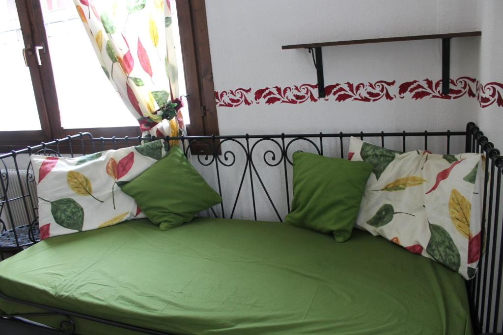Una cama o camas en una habitación de Jolly Residence