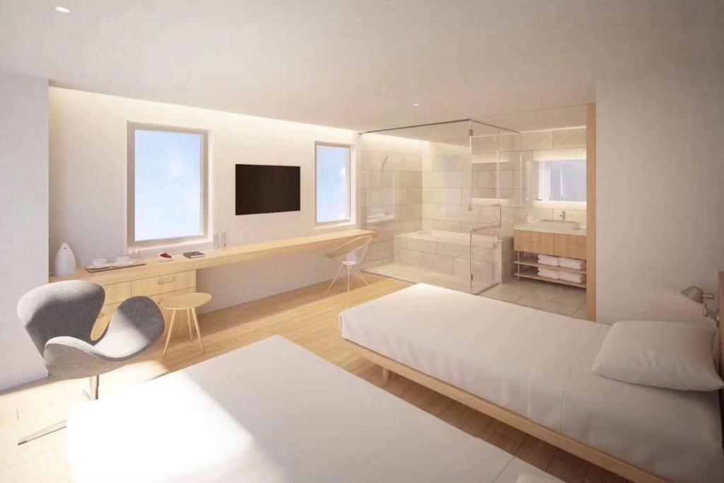 Postel nebo postele na pokoji v ubytování Hotel Comfact