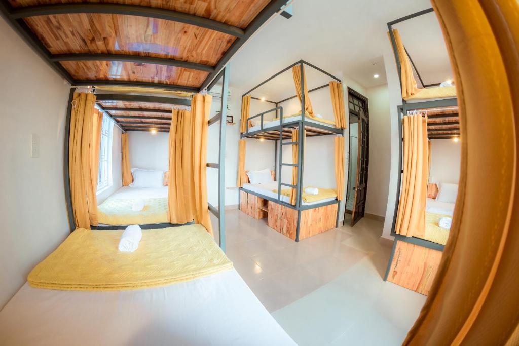 Postel nebo postele na pokoji v ubytování Rubis Hostel