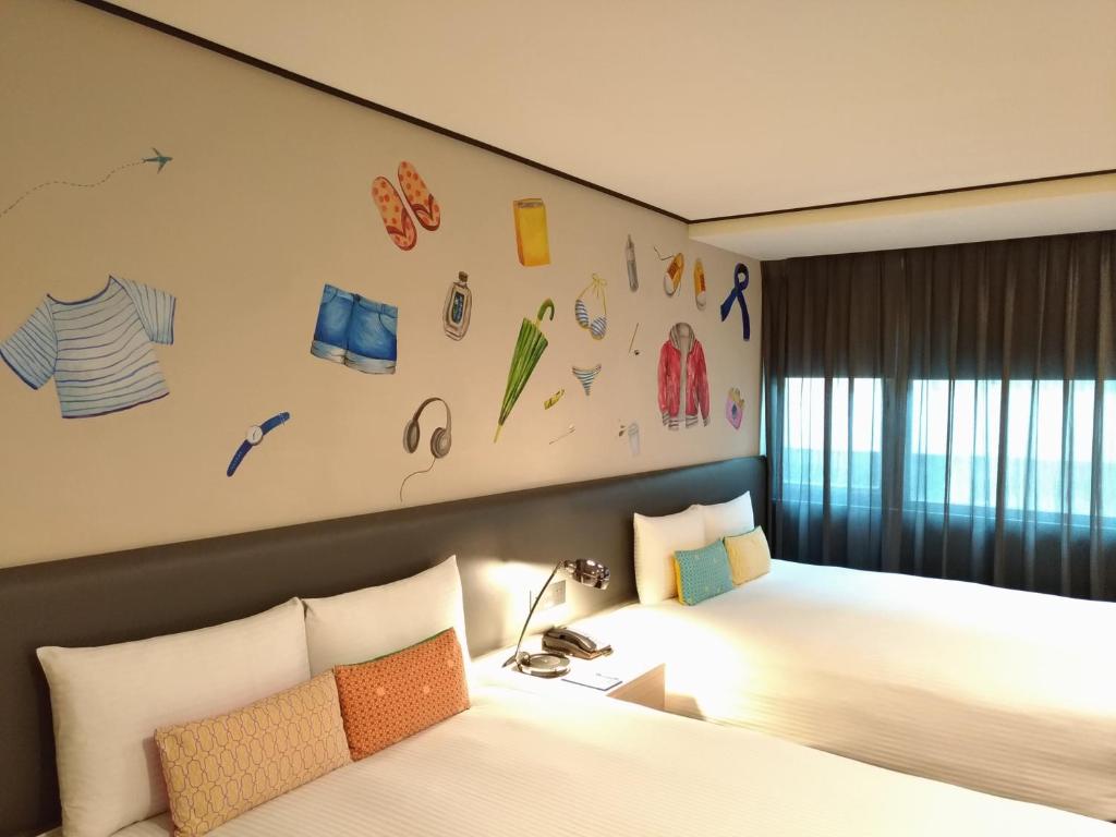 Postel nebo postele na pokoji v ubytování Energy Inn