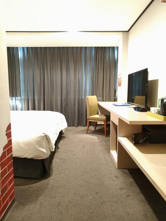 TV a/nebo společenská místnost v ubytování Energy Inn