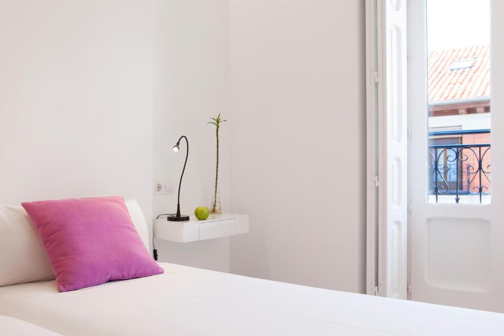 Postel nebo postele na pokoji v ubytování Artrip Hotel