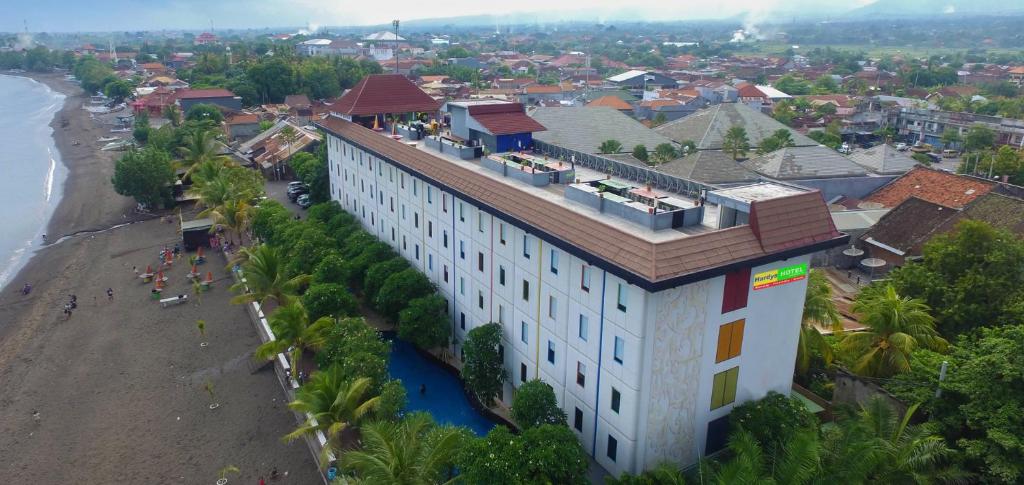 an aerial view of a hotel on the beach at Singaraja Hotel - CHSE Certified in Singaraja