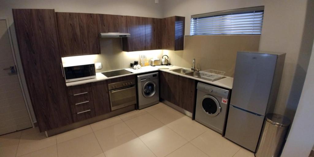 Odyssey Luxury Apartments - Back Up Generator - Appartement De Deux Chambres