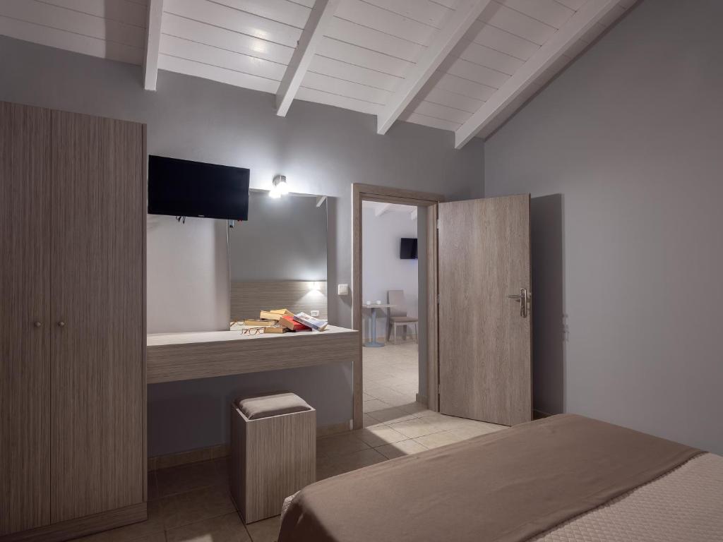 Posteľ alebo postele v izbe v ubytovaní Zante Atlantis Hotel