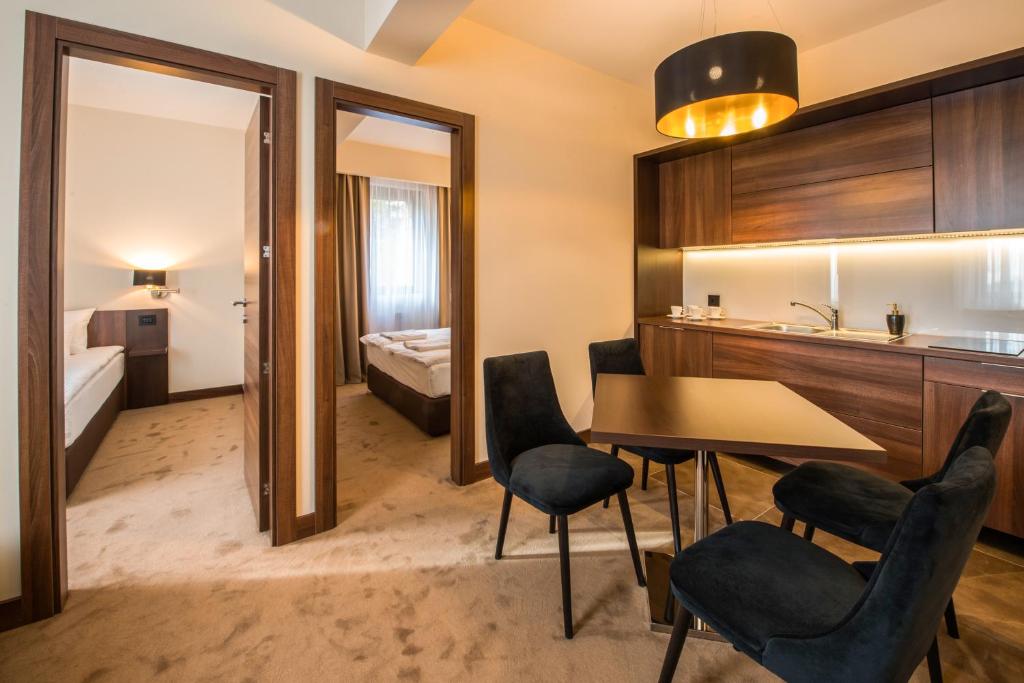 Postel nebo postele na pokoji v ubytování Hotel Spa Grad