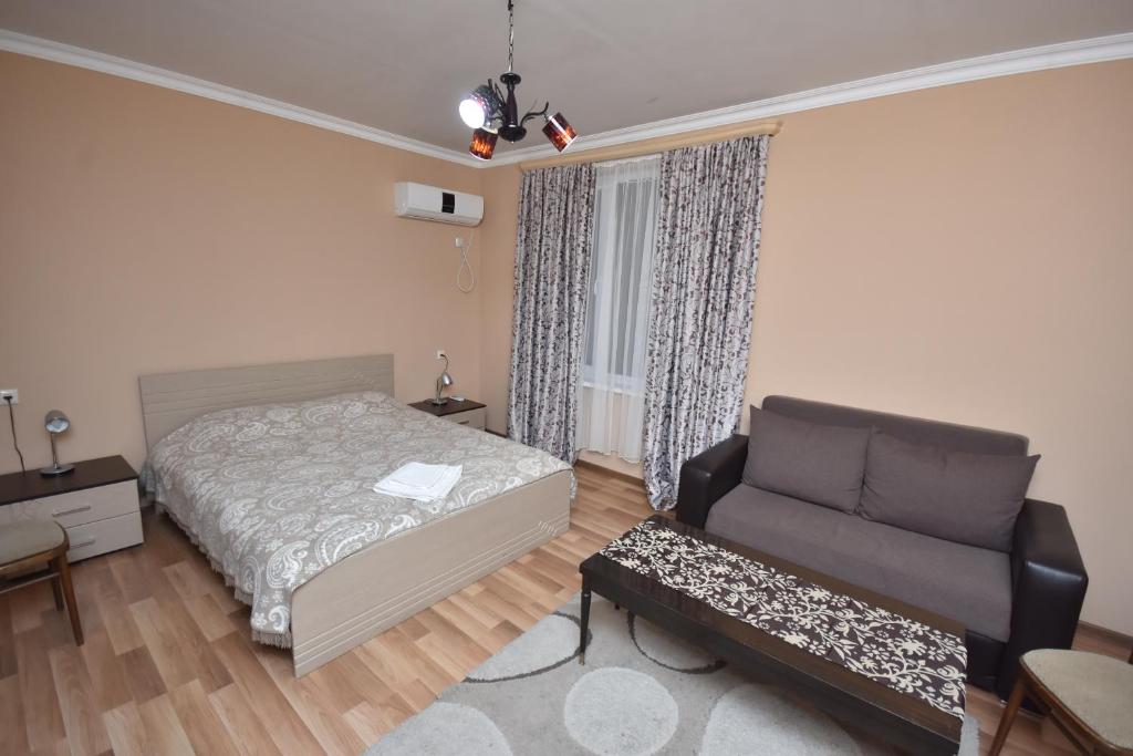 Postel nebo postele na pokoji v ubytování Guest House Green House