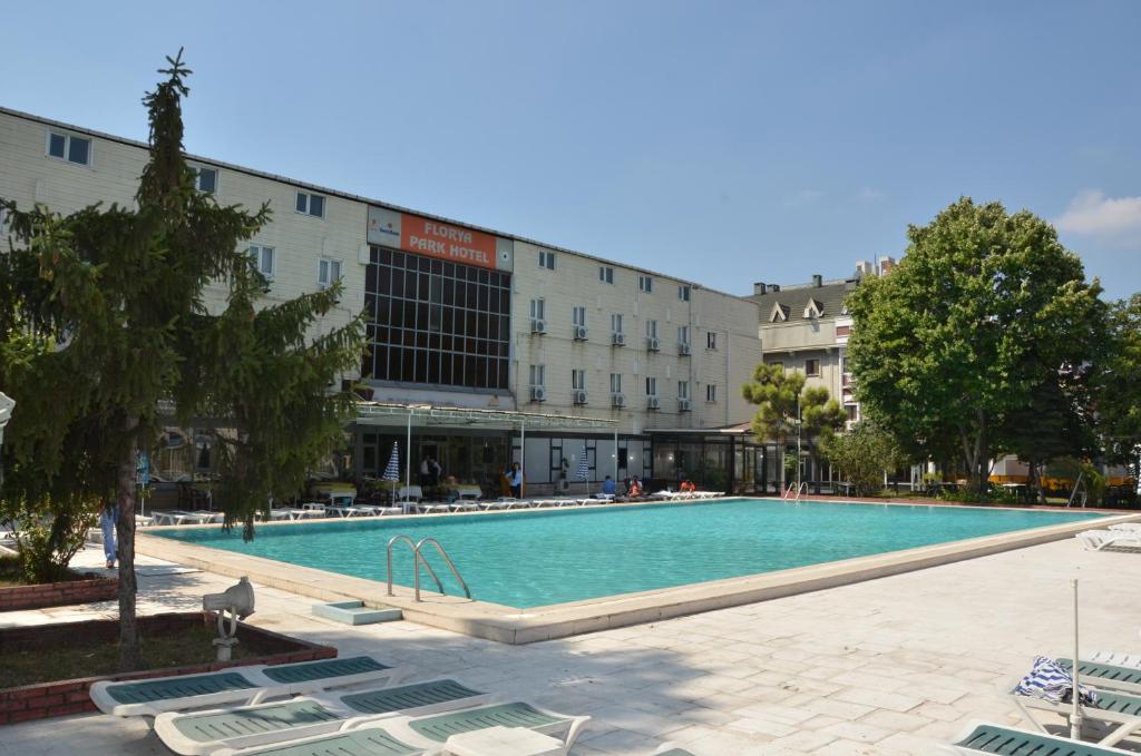 a large swimming pool in front of a building at Florya Park Hotel in Istanbul