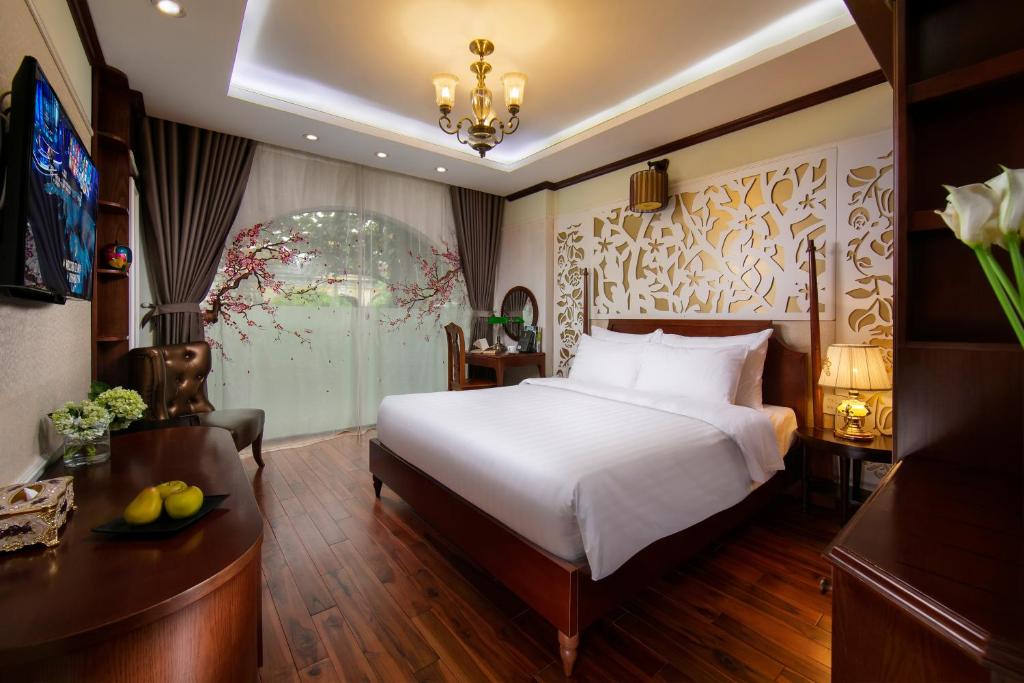 Giường trong phòng chung tại King Palace Hotel & Spa