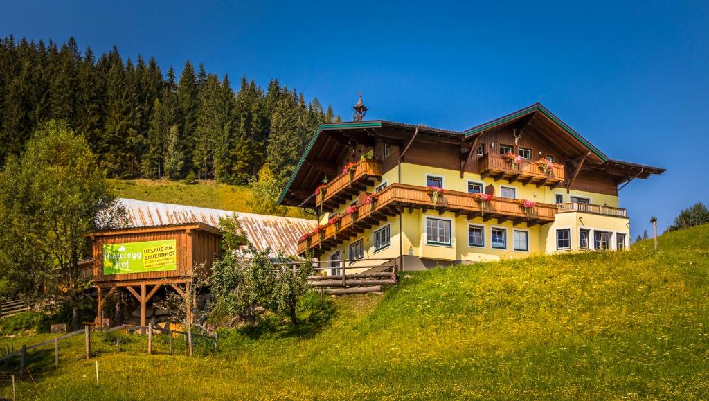 a large house on top of a hill at Hinteregghof in Forstau