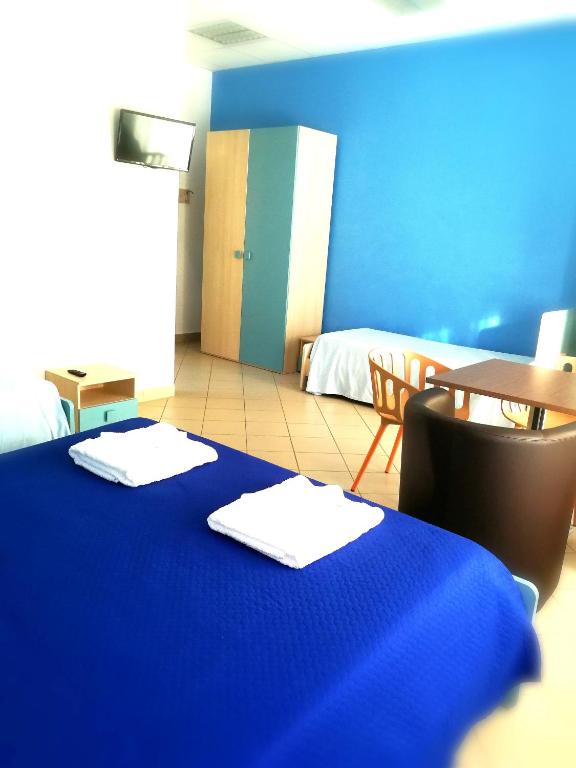Postel nebo postele na pokoji v ubytování basilicata al volo