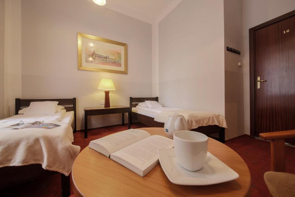 Posteľ alebo postele v izbe v ubytovaní Red Carpet Hostel